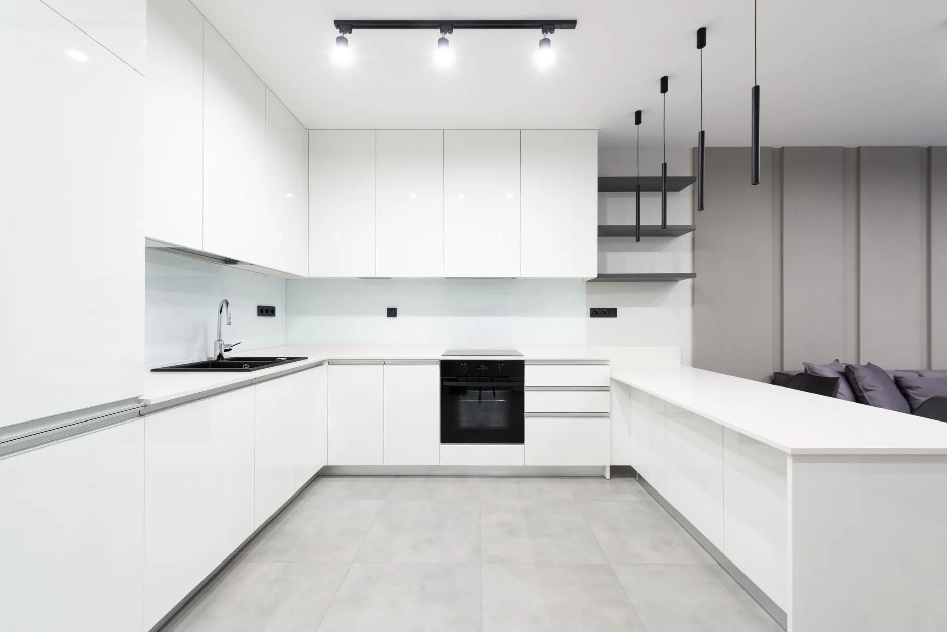 A bright, empty white kitchen after an end-of-tenancy clean